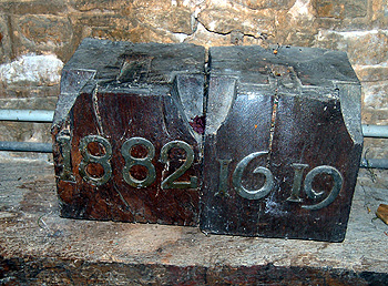 Dated roof beam supports now at the west end of the nave September 2011